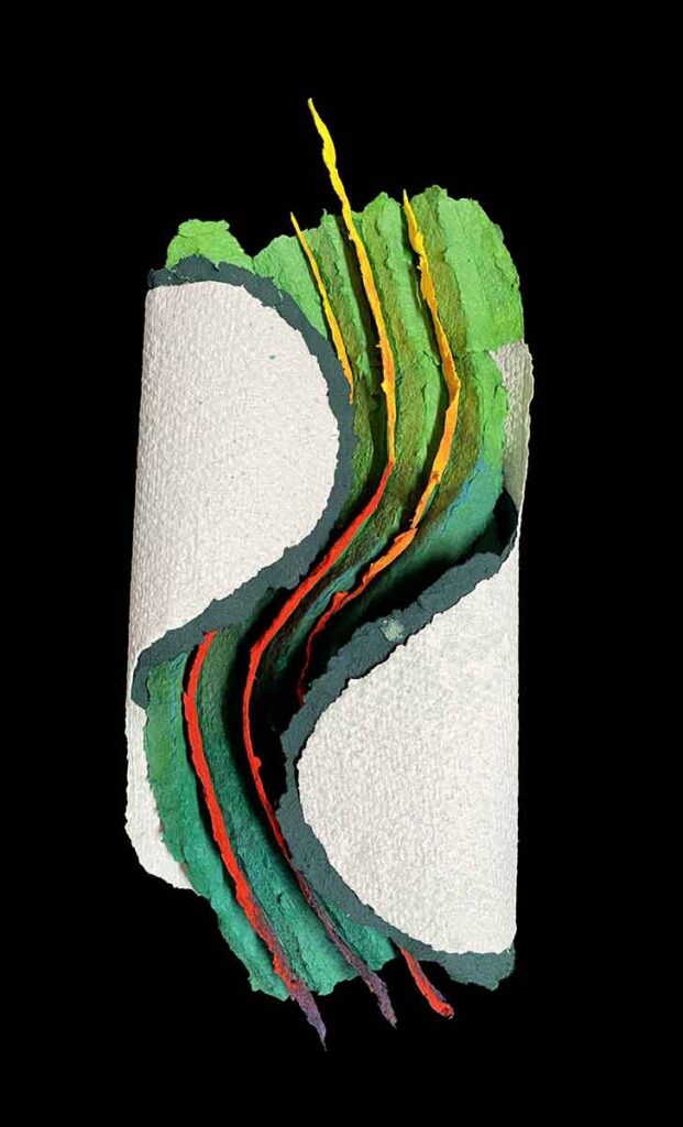 Handmade paper art by Paul Tury Mostly green paper with red and yellow stripeand white recycled paper